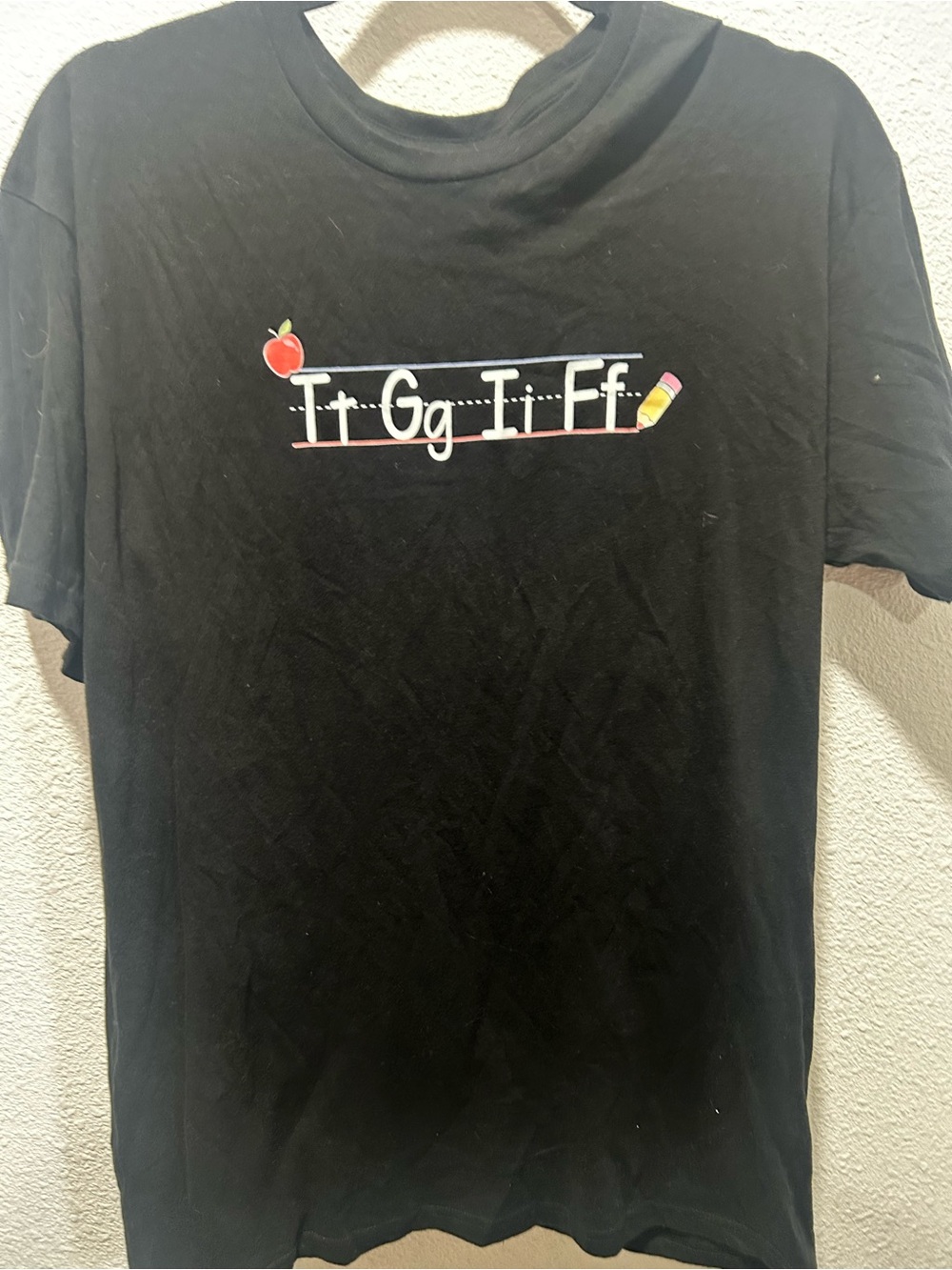 BOGO free Black Short-Sleeve Graphic Tee with Alphabet Design size large